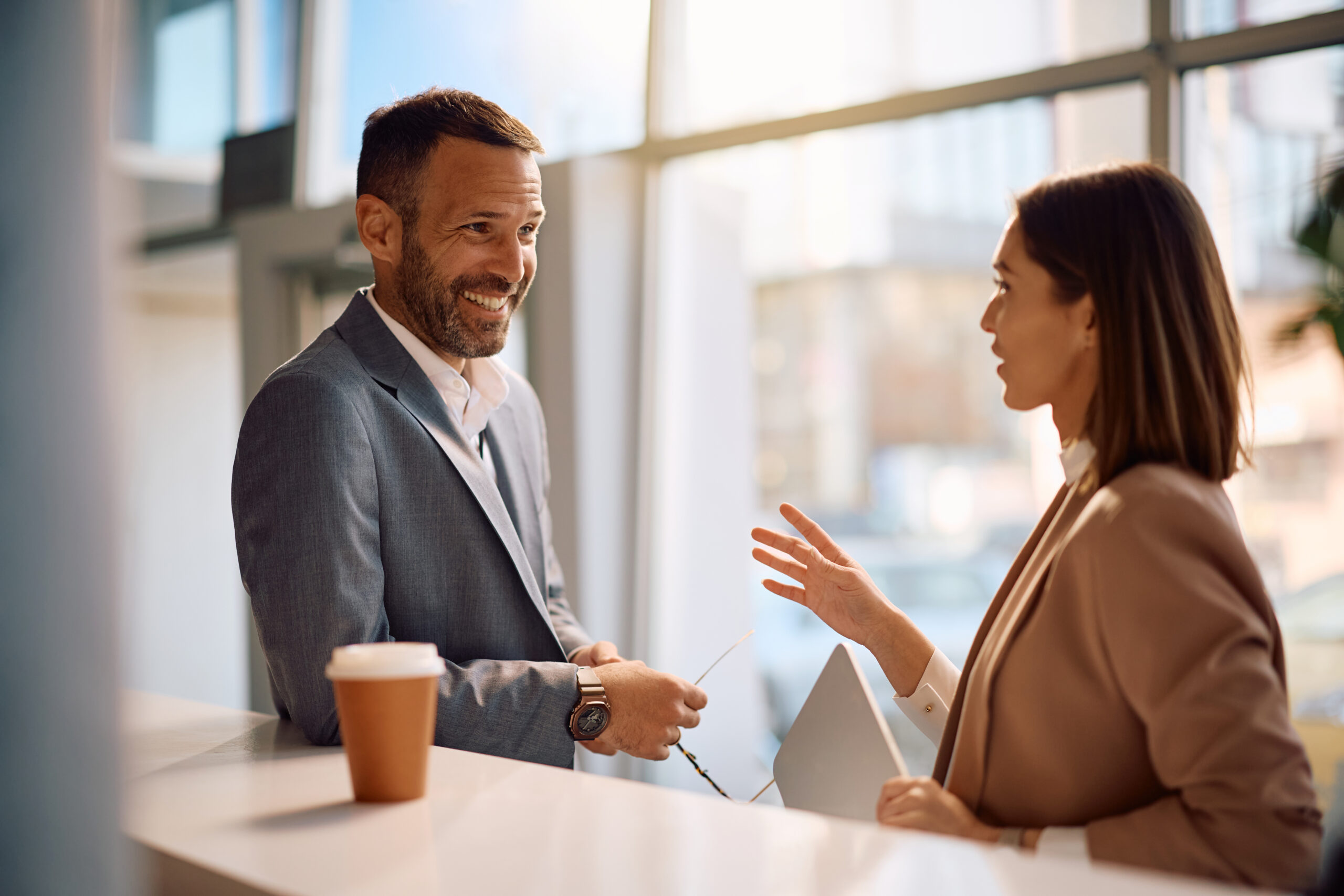 Two business professionals having small talk